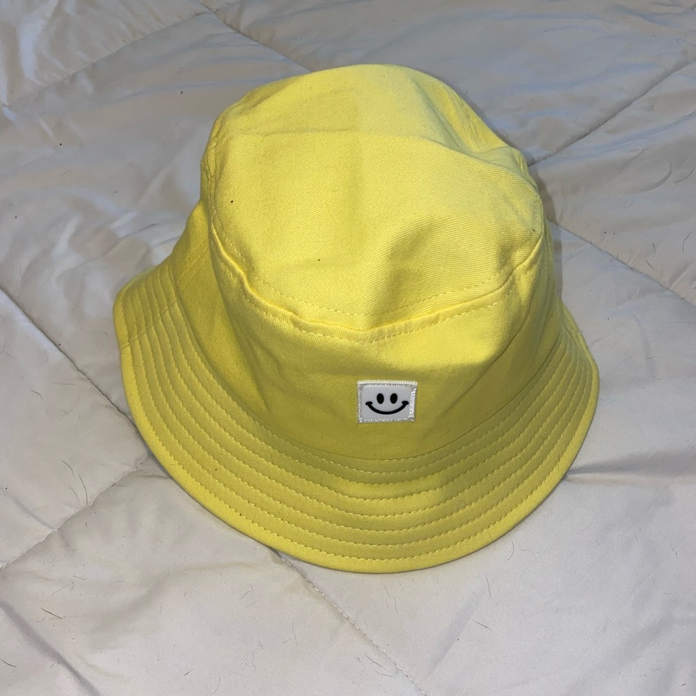 Medium yellow bucket hat smiley face
